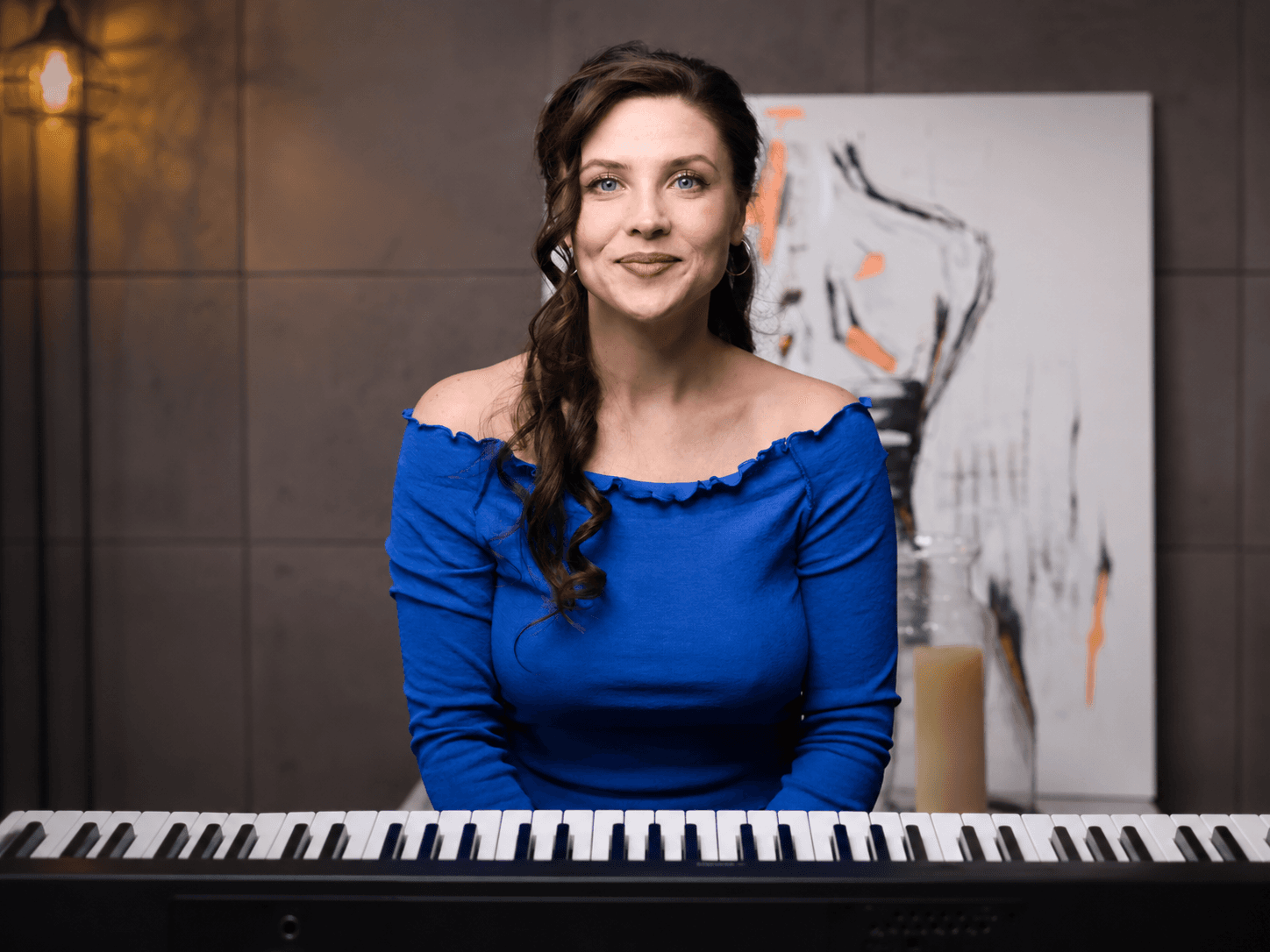 About Me — Sara at the piano